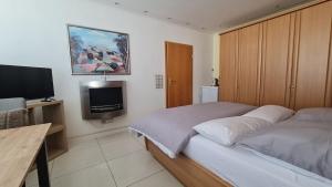 Bright room with private bathroom and market square view