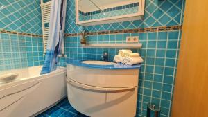 Bright room with private bathroom and market square view