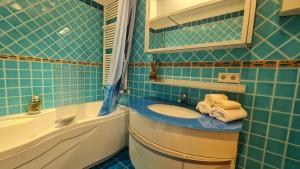 Bright room with private bathroom and market square view