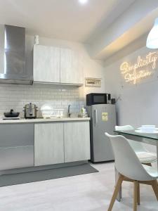 SM Bicutan Rooms by K&A