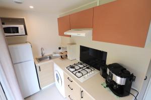 Campings Mobil Home Confort sur parcelle privee - 2 chambres - Ajaccio : photos des chambres