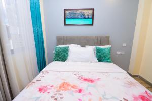 Elegant modern retreat residencies with heated swimming pool ,fully equipped gym and rooftop chillspot with amazing breathtaking city views