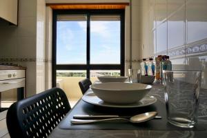 Cozy Alvor Retreat - Sunset Balcony, Wi-Fi & AC