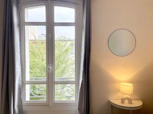 Appartements Studio lumineux et calme - Netflix, CHU et metro 14 : photos des chambres