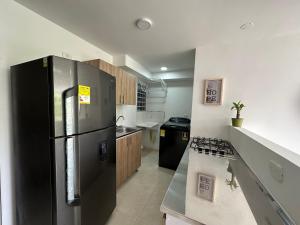 Apto con vista verde y aire acondicionado