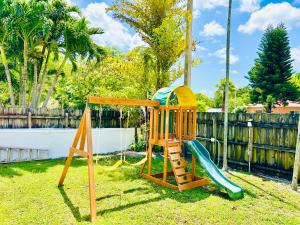 Heated Pool Tropical House with Summer Kitchen 3BR- Oasis in Miami!