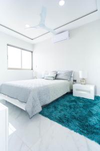 Palmarena Rooms & Residences - Long Stay Comfort with Parking, Sauna, Gym & Pool - Steps from 5th Avenue