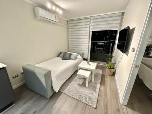 Depto nuevo y acogedor, terraza y estacionamiento
