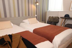 Hotels Cit'Hotel Les Alizes : photos des chambres