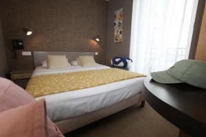 Hotels Cit'Hotel Les Alizes : photos des chambres