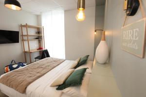 Hotels Cit'Hotel Les Alizes : photos des chambres