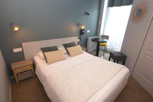 Hotels Cit'Hotel Les Alizes : photos des chambres