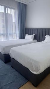 Elegantly furnished two bedroom apartment withmodern finishes swimming pool gym and stunning views in lavington