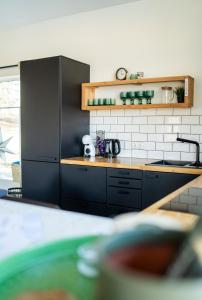 PLŪSME Restart House