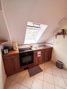 Appartements Au fil du temps : photos des chambres