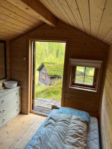 Tradisjonell norsk hytte i vakre Rasdalen