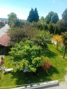 Alloggio grazioso con vista giardino e parcheggio