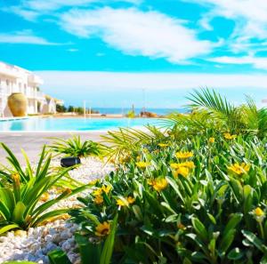 Bilocale in resort con piscine