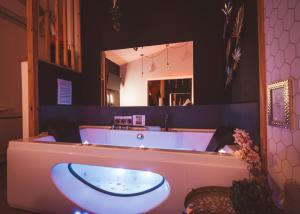 Nid Doré - Suite bien-être avec sauna & balnéo privatifs