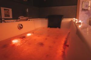 Nid Doré - Suite bien-être avec sauna & balnéo privatifs