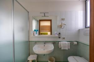 Quadruple Room with Balcony room in Hotel Ideal