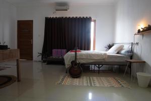 Mirri House Atas Kiri