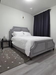 Elegant & Cozy 2 Bdrm Basement suite near WEM