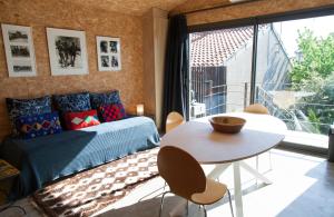Maisons de vacances Maison coloree dans un jardin : photos des chambres