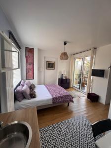 Appartements GREEN&PURPLE STUDIO 24-24 Access : photos des chambres