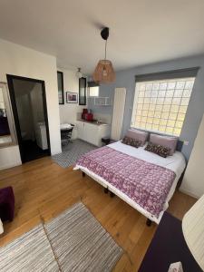 Appartements GREEN&PURPLE STUDIO 24-24 Access : photos des chambres