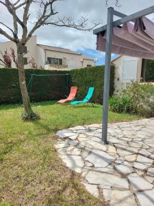 Maisons de vacances Maison dans residence avec piscine : photos des chambres