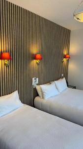 Hotels Logis Hotel Restaurant Grand Hotel de Lyon : photos des chambres