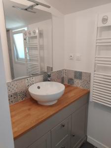 Appartements Petite maison a deux pas du centre : photos des chambres