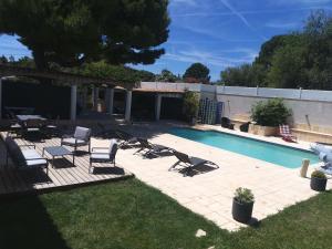 Appartements Logement cosy avec piscine et jacuzzi prive : photos des chambres