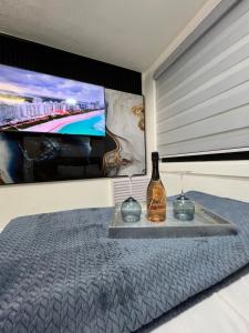 AMIRI Hollywood 5 mins from Hard Rock Stadium & The Guitar