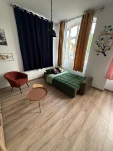 Grand F2 centre-ville, parking privée