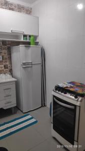 Praia Grande - De frente para o mar para casais - Oceanfront apartment for couples