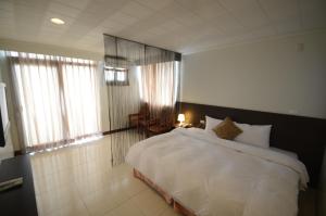Phòng Giường Đôi có Ban công và Nhìn ra Biển (Double Room with Balcony and Sea View)