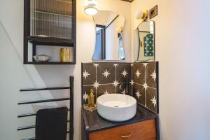 Maisons de vacances La Maison D-Ambre - Jacuzzi - Sauna- Clim : photos des chambres