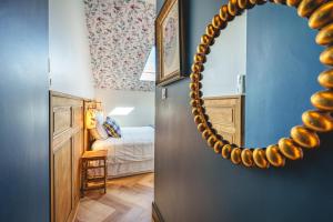 Maisons de vacances La Maison D-Ambre - Jacuzzi - Sauna- Clim : photos des chambres