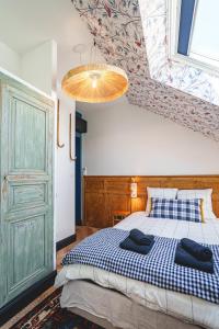 Maisons de vacances La Maison D-Ambre - Jacuzzi - Sauna- Clim : photos des chambres