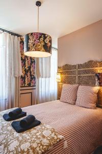 Maisons de vacances La Maison D-Ambre - Jacuzzi - Sauna- Clim : photos des chambres