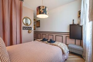 Maisons de vacances La Maison D-Ambre - Jacuzzi - Sauna- Clim : photos des chambres