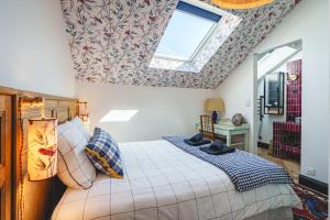 Maisons de vacances La Maison D-Ambre - Jacuzzi - Sauna- Clim : photos des chambres