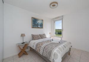 Appartements Lumaia - Vue cite, terrasse & Piscine : photos des chambres