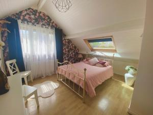 Appartements Une ambiance cosy avec jardin privatif : photos des chambres