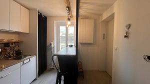 Appartements L-Escapade Central - Gare : photos des chambres