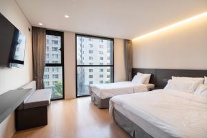 Phòng 3 Người Có Phòng Tắm Riêng (Triple Room with Private Bathroom)