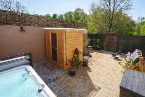 Maisons de vacances La Maison D-Ambre - Jacuzzi - Sauna- Clim : photos des chambres