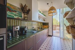 Maisons de vacances La Maison D-Ambre - Jacuzzi - Sauna- Clim : photos des chambres